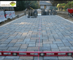 Landscape Installation of a paver driveway in Munster