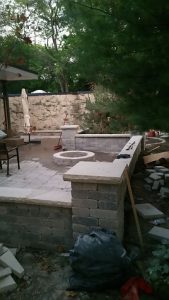 Crown Point Landscaping Service Paver Patio with fire pit, and Retaining Walls design