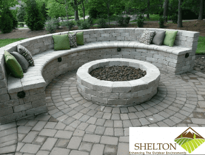 Custom Hardscape fire pit with seating and Paver Patio in Crown Point